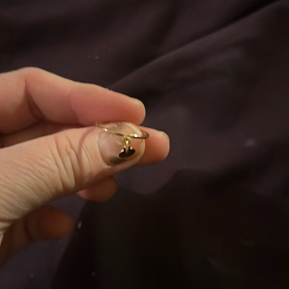 Ring with a charm